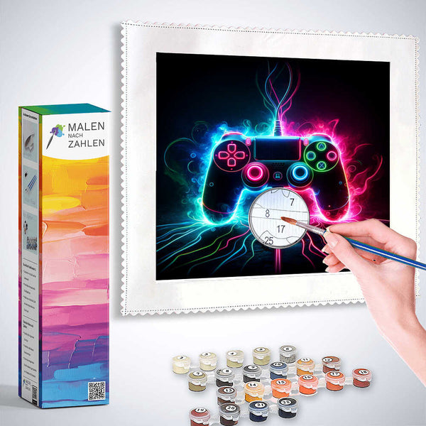 Painting by numbers kit featuring a vibrant neon game controller design, with paints, brush, and boxed set named "Malen nach Zahlen - Virtuose Visionen".