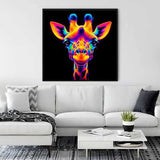 Vibrant neon giraffe painting displayed above a modern white sofa in a stylish living room.
