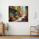 Malen nach Zahlen - Mediterranes Flüstern Kunstwerk mit einem sonnigen Dorf, warmen Orangetönen und grünen Pflanzen in einem Wohnzimmer.