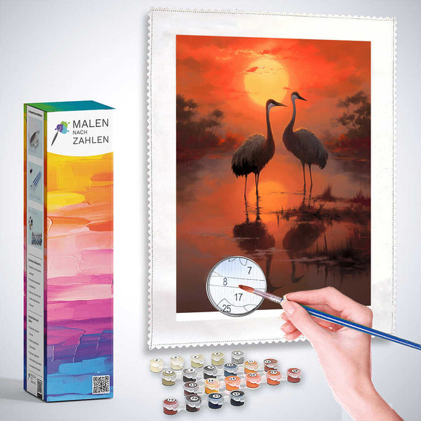 Malen nach Zahlen - Abendrot Symphonie der Kraniche, zwei Kraniche im Sonnenuntergang, warmen Rottöne im Wasser, romantisch-impressionistisch