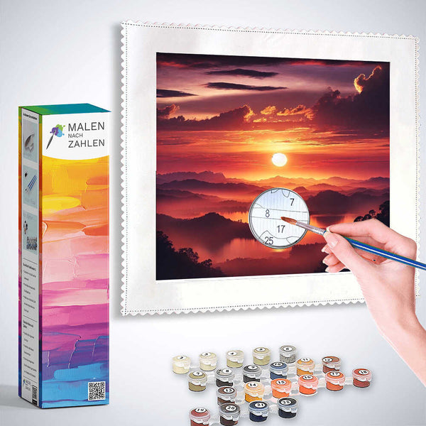 Painting by numbers sunset horizon kit with color paints, box, and hand painting canvas.