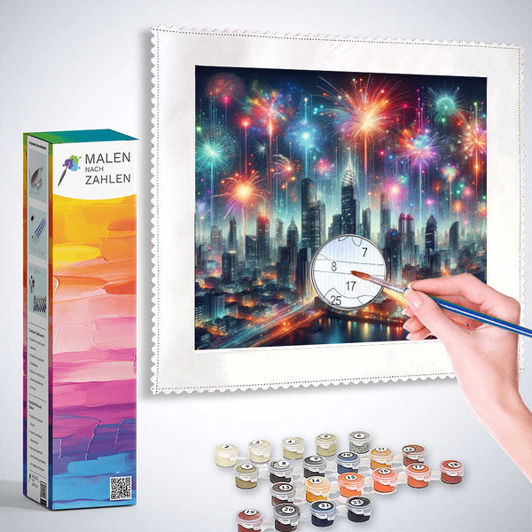 Person painting vibrant city skyline with fireworks using Malen nach Zahlen kit; includes paint pots, brushes, and numbered canvas for relaxing activity.