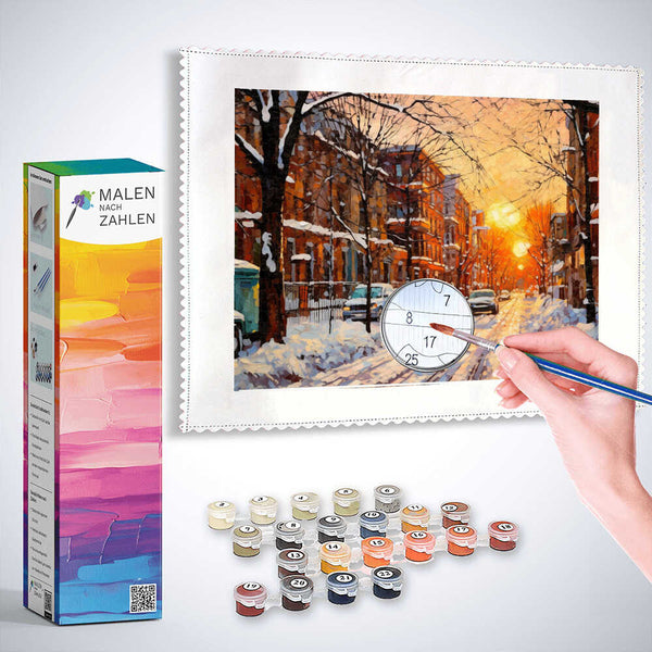 Painting by numbers kit depicting a snowy urban street at sunset with vibrant orange, red, blue, and white tones.
