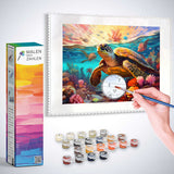 Malen nach Zahlen - Meeresmelodie - Painting of a turtle with sunset background, paint set and hand holding brush