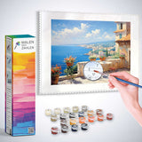 Malen nach Zahlen Set Mediterrane Träumerei, Küstenblick mit Farben, Leinwand und Pinsel, idyllische Terrasse mit Küstenlandschaft.