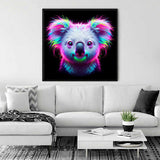 Modern living room with a vibrant, neon-colored koala painting on the wall above a white sofa.