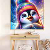 Adorable penguin wearing a colorful winter hat in a vibrant, snowy painting displayed above a minimalist desk.