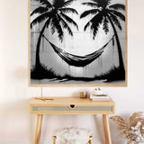 Painting of a tropical scene with black and white palm trees and hammock, enhancing relaxation vibes with Malen nach Zahlen technique.