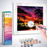 Malen nach Zahlen - Abendglühen im Geheimen Wald Kit shown with painting, color palette, and paintbrush in use