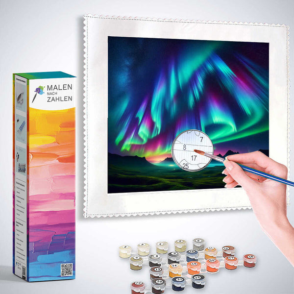 Painting by numbers kit featuring a dreamlike Northern Lights landscape with colorful paints and brushes.