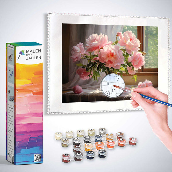 Painting by numbers kit with morning light and peonies, featuring a hand holding a brush, painting delicate flowers in a glass vase.