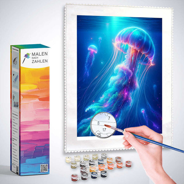 Diamond painting of a glowing jellyfish in deep blue water with vibrant purple and pink hues, surrounded by a painting kit and a hand holding a brush.