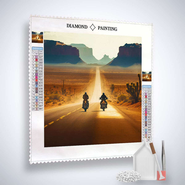 Diamond painting kit with motorcyclists on desert road, includes canvas, acrylic diamonds, tweezers, and setting pen
