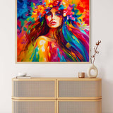 Colorful woman painting displayed above a beige woven cabinet with minimalistic decor.
