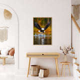 Painting of an eagle taking off from water, displayed on a wall in a stylishly decorated modern living room.
