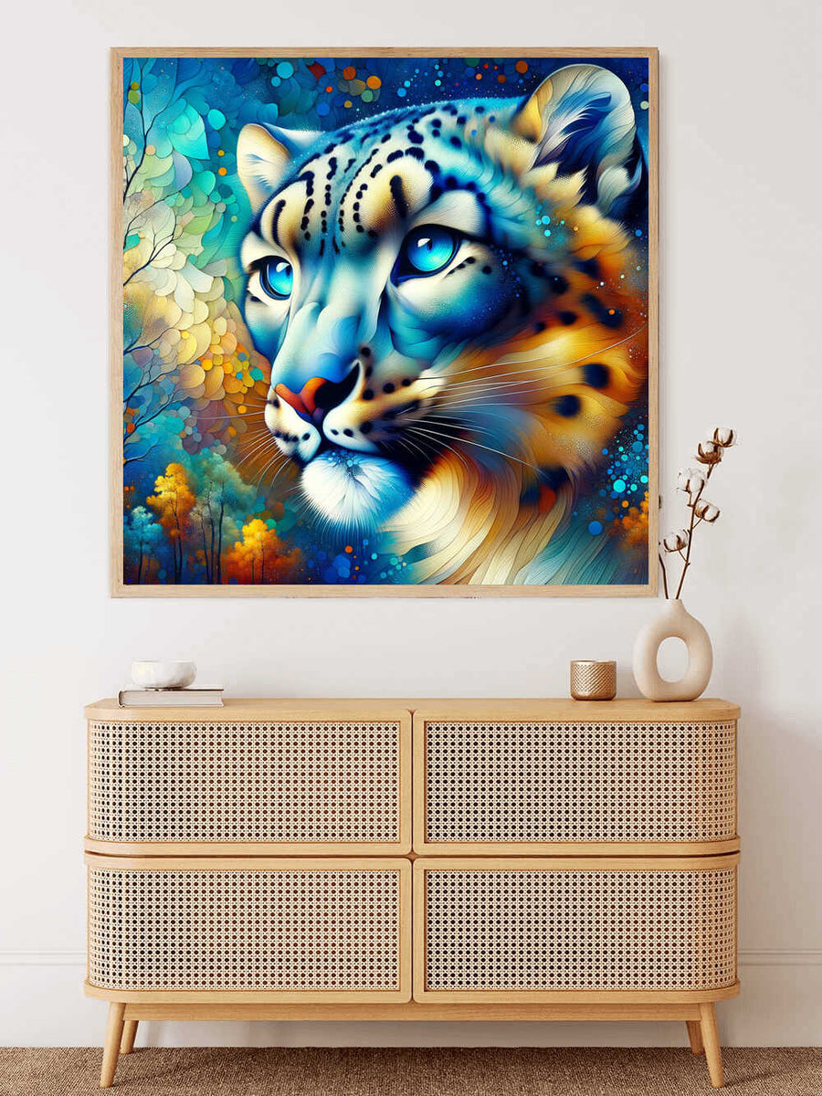 Diamond painting of a majestic snow leopard in blue and turquoise tones with captivating ocean-blue eyes and warm autumn hues.
