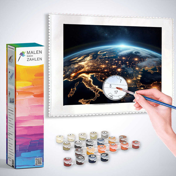 Malen nach Zahlen - Erleuchtete Erde Produktbild zeigt Malset mit leuchtendem Planetenbild und Malutensilien.