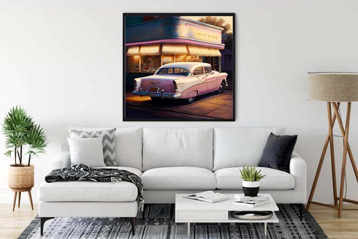 Living room with a 1950s gas station painting on the wall, showcasing a vintage car and retro vibes.