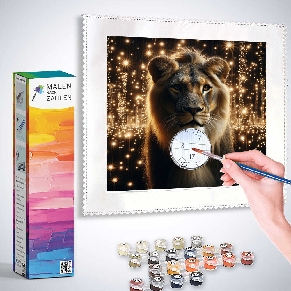 Paint by Numbers - Sternenmähne, showing a hand painting a lion's mane with a brush, paint pots, and Malen nach Zahlen box in the foreground.