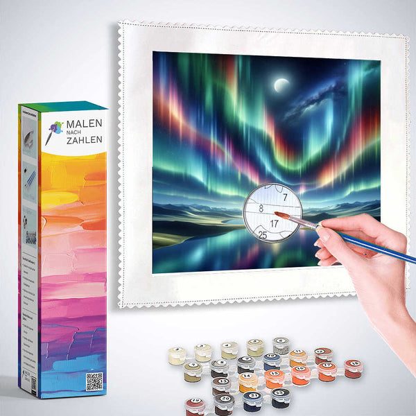 Malen nach Zahlen - Polarlichter der Stille kit showing hand painting colorful northern lights with paint pots and brush.