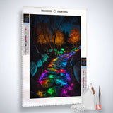 AB Diamond Painting Kit - Leuchtender Weg with colorful glowing path on canvas, acrylic diamonds, tweezers, and setting tool.