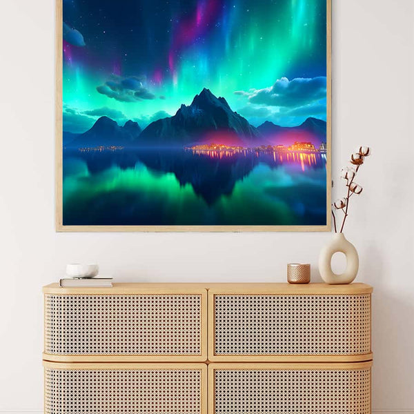 AB Diamond Painting - Polarlichter mit leuchtender Stadt Kunstwerk über einem modernen Schrank.