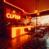 Stylish cafe interior with orange neon lights and modern seating arrangements.