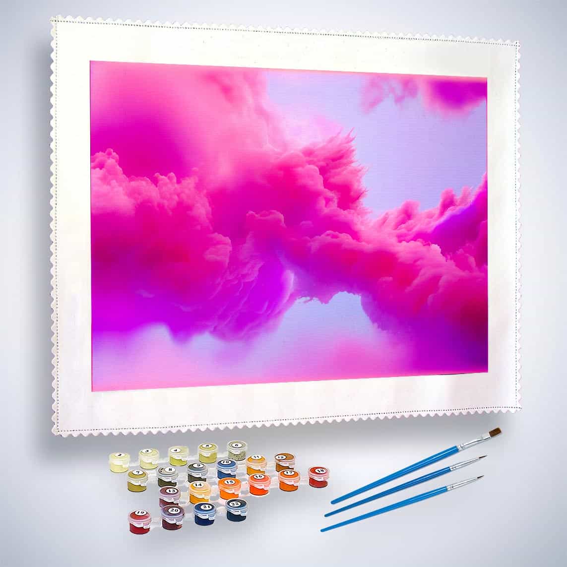 Paint by Numbers kit with pink cloud painting, paint pots, and three brushes styled against a white lace-edged canvas.