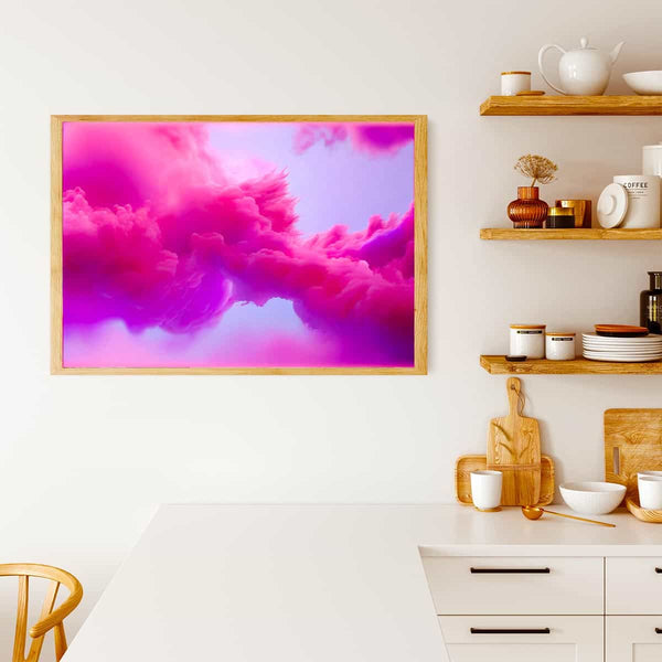 Pink and purple abstract cloud art framed on the wall in a modern kitchen with white counters and wooden shelves.