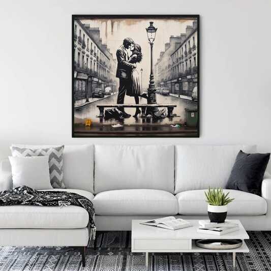 Painting of a couple in love kissing in Paris cityscape displayed above a modern white sofa in a stylish living room.