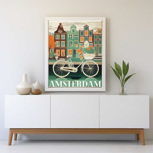 "Amsterdam-themed art piece from Malen nach Zahlen depicting a bicycle in front of colorful canal houses, displayed on a minimalist shelf"