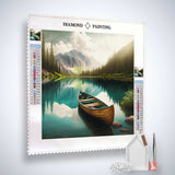 Diamond painting kit with a serene lake scene featuring three boats, mountains, and a forest background.