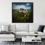 Living room with a framed painting of Schloss Neuschwanstein surrounded by greenery above a white couch.