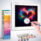 Painting by numbers kit featuring a cosmic heart design with vibrant colors, brush and paint pots included for a relaxing art experience.