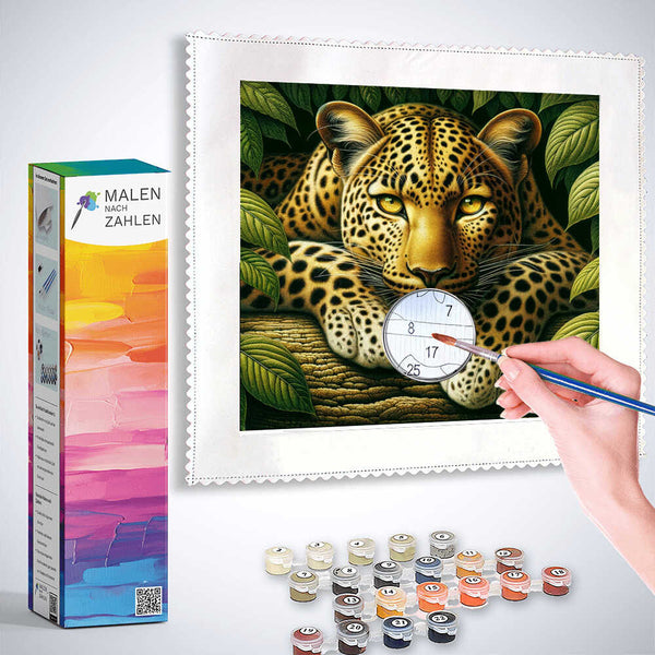 Diamond painting kit with leopard portrait among lush leaves, showcasing realistic golden and ochre fur with vivid green background